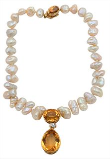 Pearl Necklace with 14 Karat Gold Clasp, mounted with oval citrine and drop pendant in 14 karat gold, having oval citrine and oval diamond over teardr