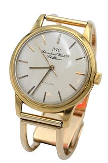 14 Karat Gold International Men's Wristwatch, having openwork, 14 karat gold band, dial marked International Schaffhausen, 36.4 millimeters, total wei