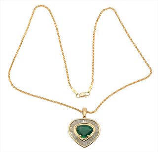 Emerald and Diamond Pendant, set in 14 karat yellow gold, having mixed cut natural pear emerald, 2.94 carats, 9.52 - 12.28 x 4.59 millimeters surround