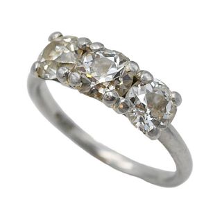 Platinum Ring, set with three diamonds across, each approximately .85 carats each, size 6.