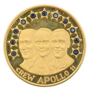 Crew Apollo 11 Gold Medallion Limited Edition, set with 11 sapphires, #4 on edge, 38 millimeters, 60 grams. Provenance: Collection of Anton Peek previ