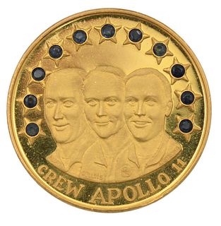 Crew Apollo 11 Gold Medallion Limited Edition, having 11 sapphires, #10 on edge, in plastic case, 38 millimeters, 60 grams. Provenance: Collection of 
