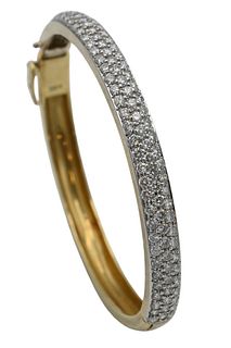 18 Karat Yellow Gold Bracelet, having three rows of diamonds, 21.5 grams.