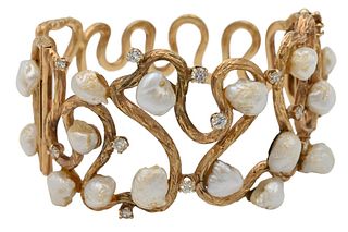 Gold, Diamond and Pearl Openwork Bangle Bracelet, width 1 3/8 inches, 49 grams.