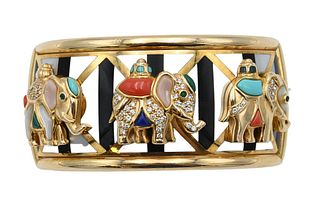 Asch Grossbardt 14 Karat Gold Cuff Bracelet, mounted with three elephants having turquoise, coral and diamonds on backdrop of black and mother of pear