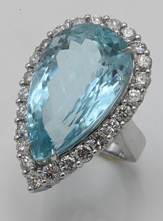 Aquamarine and Diamond ring, 18 karat white gold ring set with pear shaped aquamarine, 37.07 carats surrounded by 26 diamonds totaling 3.72 carats, si