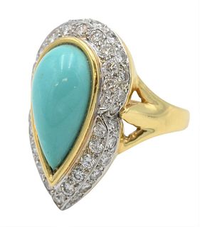 R. Stone 18 Karat Yellow Gold Ring, set with teardrop turquoise surrounded by two tiers of diamonds, size 5 3/4, 16.1 grams.