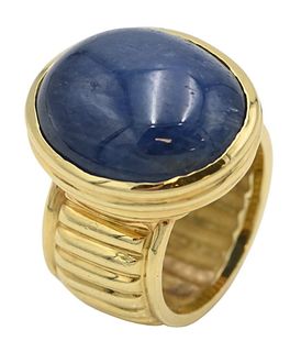 Tambetti 18 Karat Yellow Gold Ring, set with large oval sapphire?, size 7, 17 x 19.6 millimeters, 22 grams total weight.