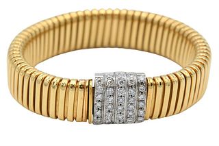 18 Karat Yellow and White Gold Flexible Bracelet, mounted with 33 diamonds, length 6 5/8 inches, 47 grams.
