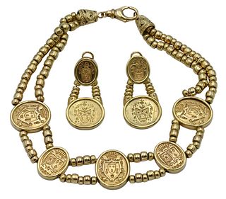 18 Karat Gold Three Piece Set, to include ear clips and necklace, all mounted with oval medallions in the form of coat of arms and gold beads, ear cli