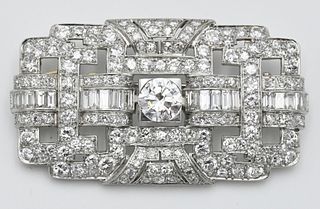 Platinum Diamond Brooch, rectangular shape, measuring approximately 2 x 1 1/8 inches, pave set with 154 round full and single cut diamonds, diamonds h