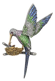 18 Karat Gold and Sterling Silver Hummingbird Brooch, on a nest with a branch, completely encrusted with diamonds, blue sapphires, emeralds, pink sapp