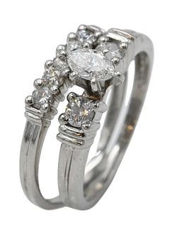 Platinum Two Piece Bridal Set, to include engagement ring with center marquise diamond, 3.3 x 6 millimeters, flanked by diamonds along with a band set