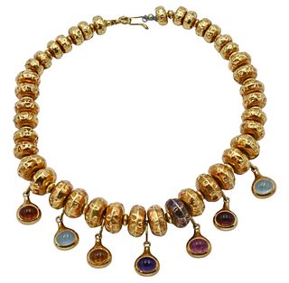 18 Karat Gold Bead Necklace, having suppressed round beads along with seven hanging oval cabochon cut stones, length 14 1/2 inches, 113.3 grams total 