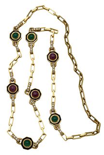 18 Karat Yellow Gold Necklace, mounted with seven medallions, mounted with pink sapphires, green stones, and diamonds on nearest links, attributed to 