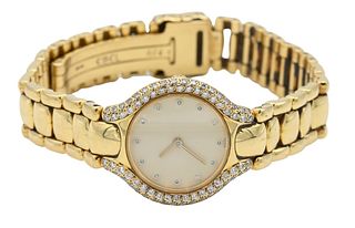Ebel 18 Karat Yellow Gold Ladies Wristwatch, having 18 karat gold band and diamond surround, length approximately 6 3/4 inches, 24.5 millimeters, 76 g