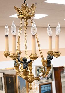 French Empire Bronze and Gilt Bronze Hanging Light, having crowned top over three star and link chains, holding three figural winged arms with two lig