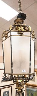 Iron, Bronze and Frosted Glass Hall Light, having leafy top and bottom, height 44 inches, along with 3 - 5 feet of chain.