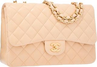Chanel Beige Quilted Lambskin Leather Jumbo Single Flap Bag with Matte Gold Hardware Excellent to Pristine Condition 12" Width x 8" Height x 3" Depth