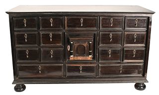 Ebonized Table Desk, having center door, inlaid interior surrounded by 16 drawers, on suppressed feet, 18th century, height 22 inches, top 14 1/2" x 3