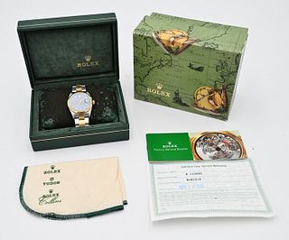 Rolex Oyster Perpetual Datejust Mens Wristwatch, having blue dial, 18 karat gold bezel with stainless and gold bracelet, with sapphire crystal and box