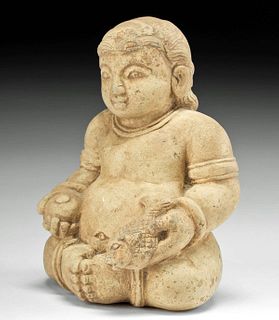 Majapahit Pottery Figure of a Deity Holding Fish