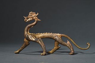 Tang: A Gilt Bronze Dragon Figurine