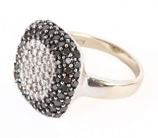 A Lady's White and Black Diamond Ring