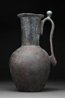 LATE SASSANIAN OR EARLY ISLAMIC BRONZE EWER WITH PROTRUDING LIP