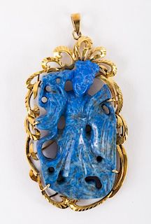 A Gold Lapis Carved Pendant
