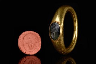 A ROMAN GOLD AND FEROZA INTAGLIO DEPICTING MINERVA
