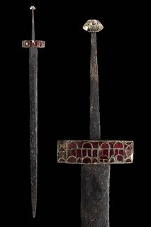 A MEROVINGIAN IRON SPATHA SWORD WITH ALMANDINE GARNET AND ROCK-CRYSTAL POMMEL