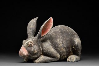 A RARE CHINESE HAN DYNASTY TERRACOTTA BLACK RABBIT WITH TL TEST