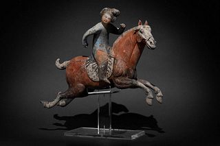 A CHINESE TERRACOTTA TANG DYNASTY POLO RIDER WITH TL TEST