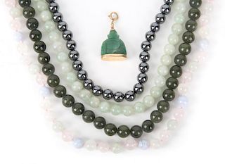 Jade and Hematite Beads along with a Jade Buddha
