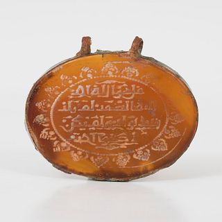 Medallion; Hispanic Muslim, X- XIV centuries. 
Carved resin. 
Slightly damaged.