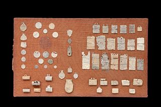 Set of amulets and reliquaries; Hispano-Muslim art; 9th-15th century AD. 
Lead and amphora.