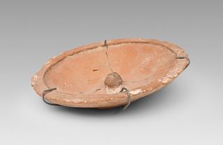 Jug lid; Hispano-Muslim art; Almohad period, 13th century A.D. 
Ceramics.