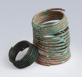 Etruscan bracelets, 5th and 6th centuries BC. 
Bronze. 
Measures: 8,5 x 7,5 cm and 2,5 x 4 cm.