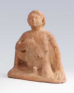 Etruscan figure of the III-II century BC. 
Terracotta. 
Measures: 26,5 x 23 x 7 cm.