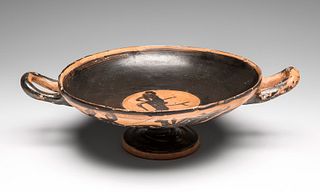 Kylix; Attica, 6th century BC. 
Black glazed ceramic. 
Measures: 7 x 25 cm.