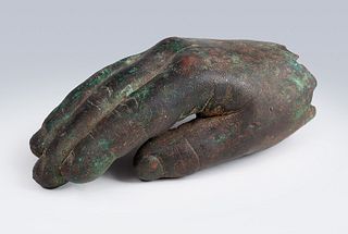 Hand fragment of a Roman sculpture, 2nd-3rd century A.D. 
Bronze. 
Measures: 12 x 4 x 7 cm.