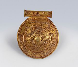 Etruscan bulla, 5th century BC. 
In yellow gold. 
Measures: 2,5 x 2,3 cm.