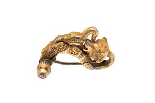 Zoomorphic fibula. Celtiberian culture, IV-II centuries BC. 
In gilded silver. 
Collection L.Vila Casas, Barcelona, ca. 1960. 
Measures: 3,5 cm.