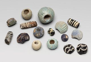 Necklace beads. Phoenician culture, I millennium BC. 
Vitreous paste.