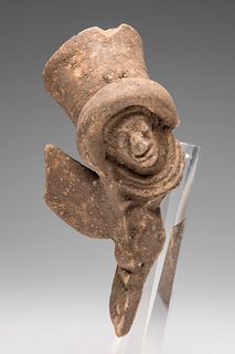 Fragment of huaco. Ecuador, pre-Columbian culture. 
Terracotta.