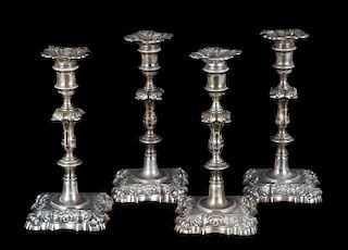 Four George II sterling silver candlesticks
