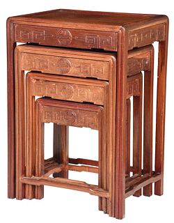Nest of Four Chinese Carved Tables
