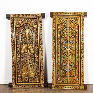 TWO BALINESE CARVED PARCEL GILT & POLYCHROME DOORS