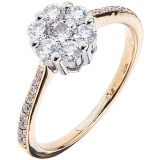 RING WITH DIAMONDS IN WHITE AND YELLOW 14K GOLD Brilliant cut diamonds ~0.45 ct. Weight: 2.5 g. Size: 5 ¾ | ANILLO CON DIAMANTES EN ORO AMARILLO Y BLA